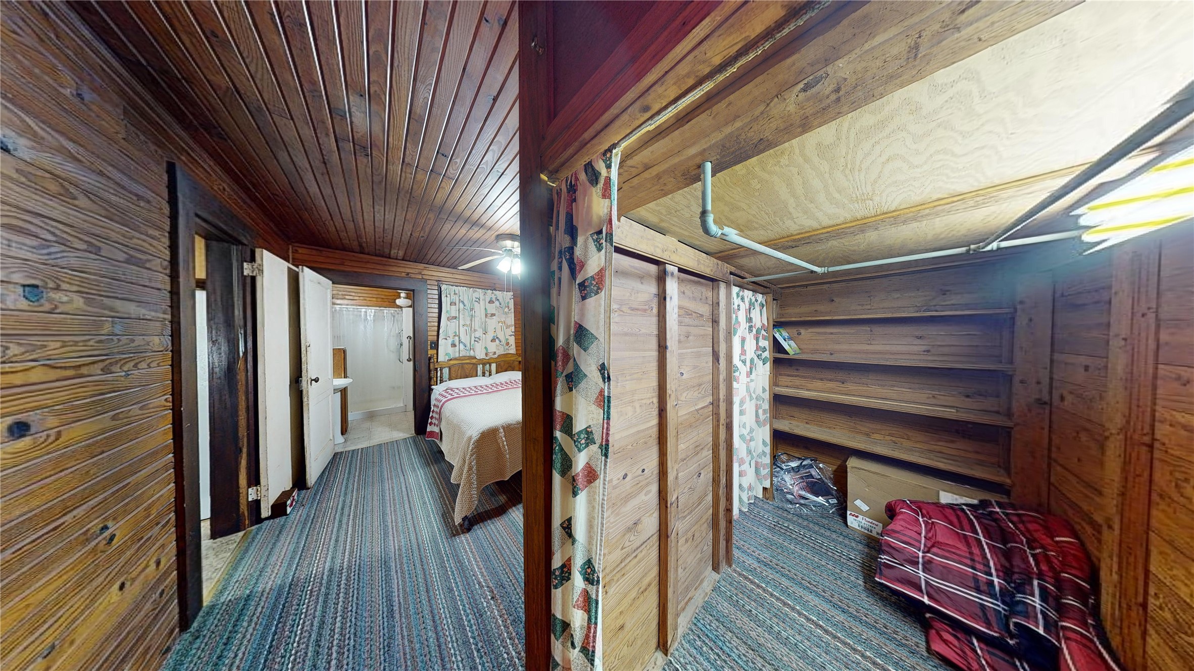 18157 State Highway 87 Call, TX 75933 - Photo 7 of 39 a view of walk in closet with wooden floor