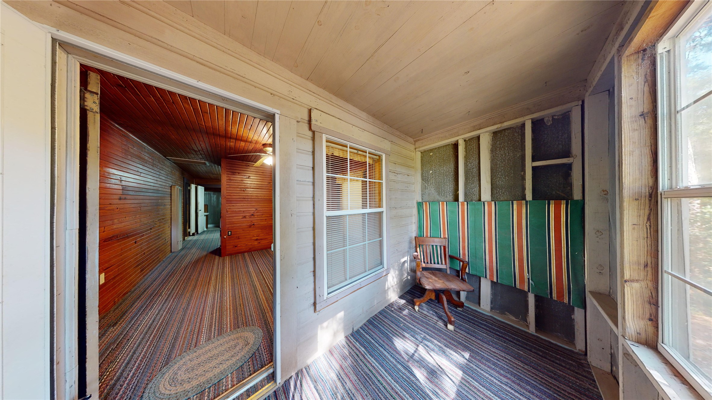 18157 State Highway 87 Call, TX 75933 - Photo 8 of 39 a hallway with table and chairs