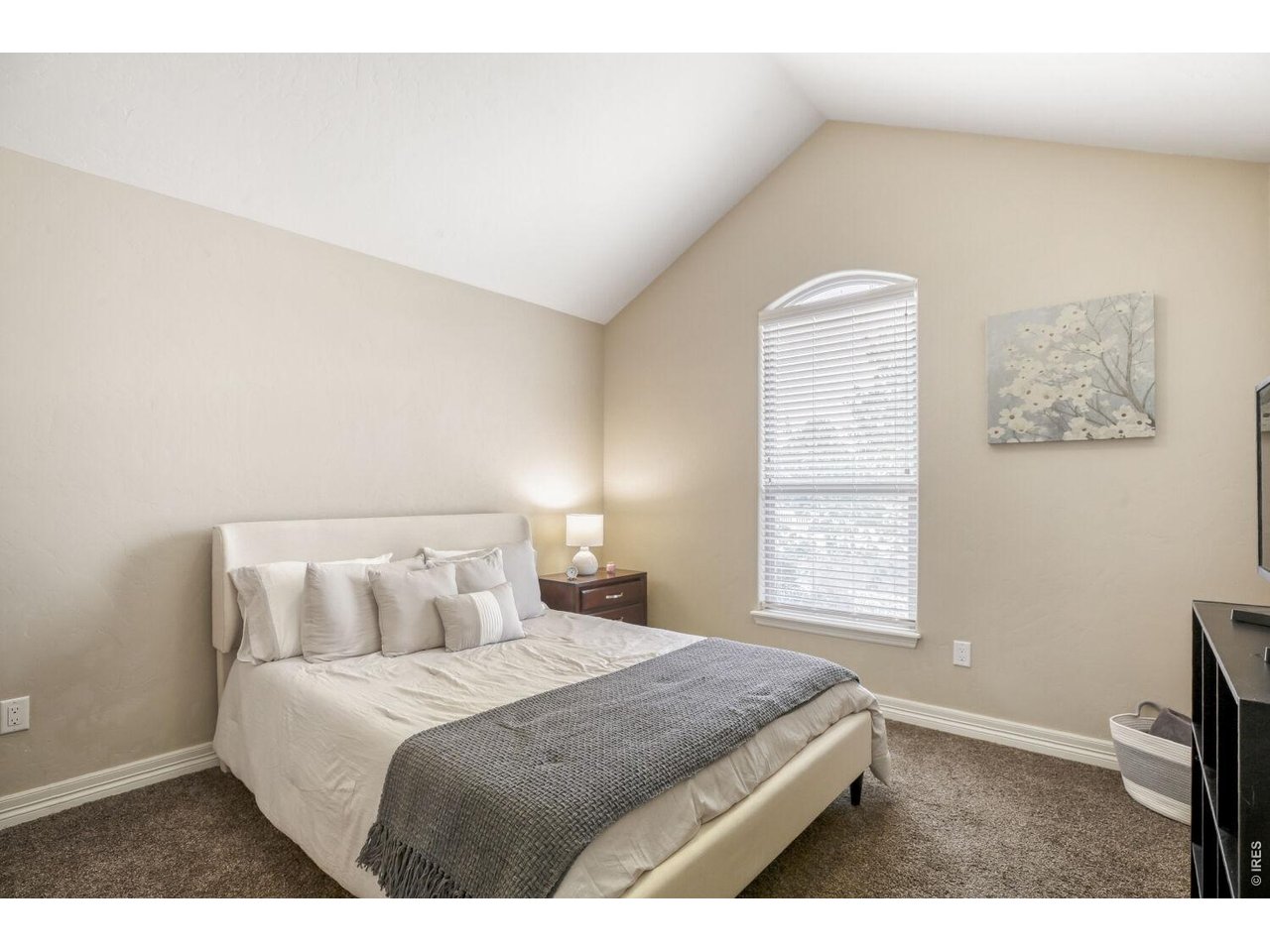 7992 St Street Frederick, CO 80530 - Photo 16 of 28 a bedroom with a bed and a window