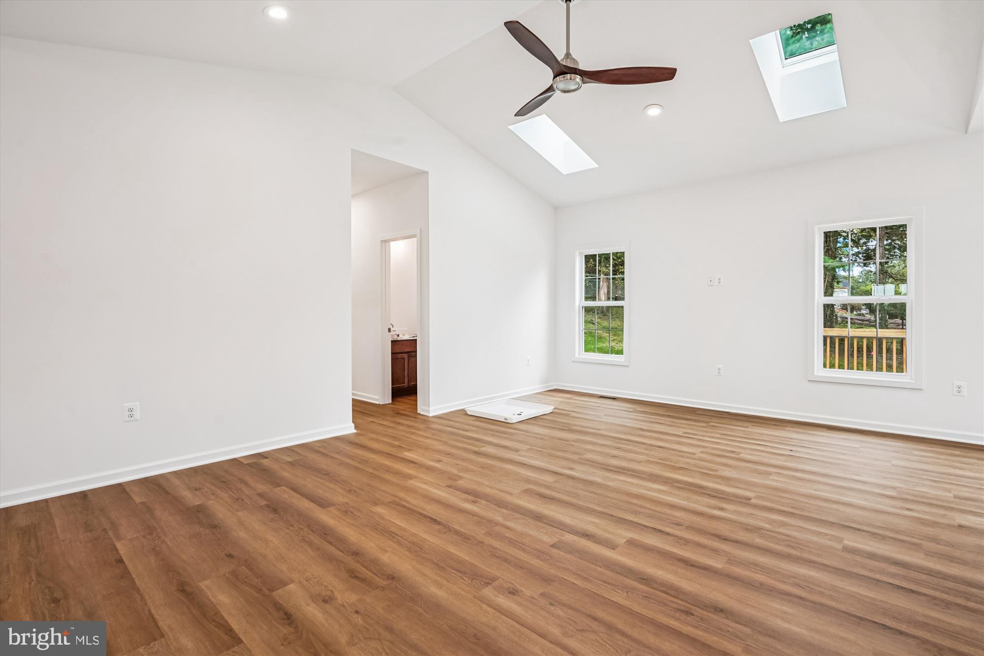 1 Eggbornsville Road Rixeyville, VA 22737 - Photo 52 of 66 a view of an empty room with wooden floor and a window