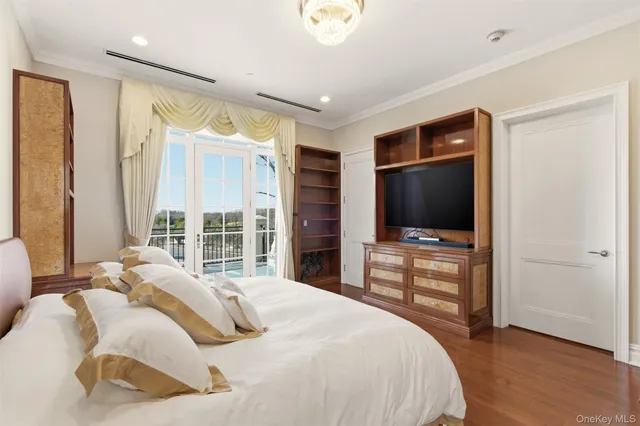 a bathroom with a sink mirror vanity and toilet