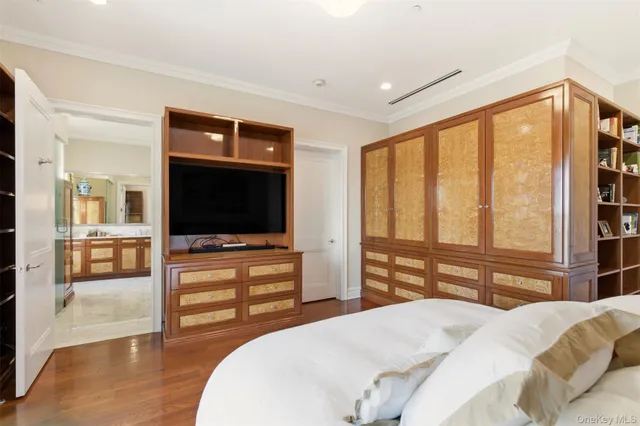 a view of a gym room with lots of gym equipment