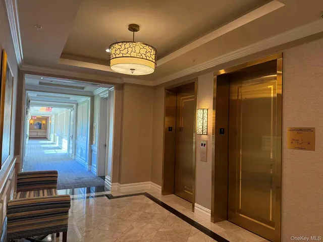 a view of a livingroom with furniture and window