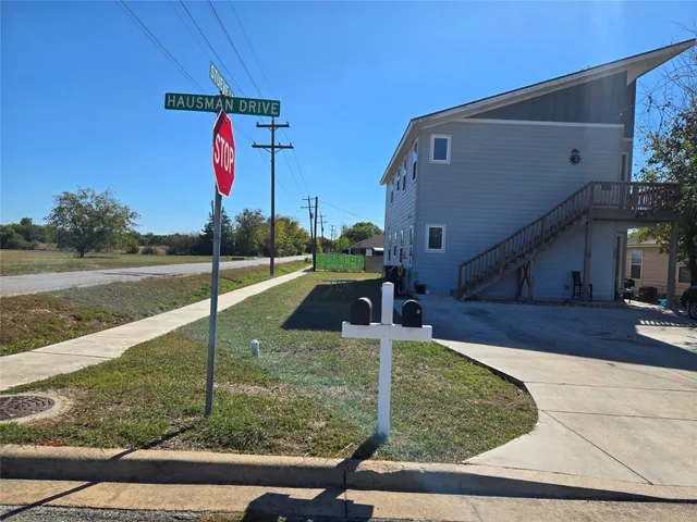 a view of a house with a park