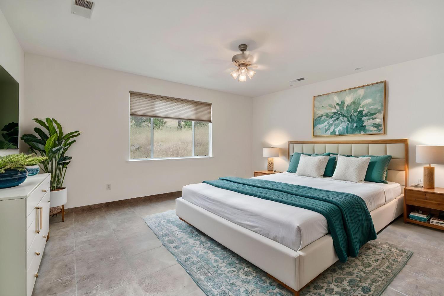 6864 Rodeo Drive Sanger, CA 93657 - Photo 35 of 48 a bedroom with bed and a window