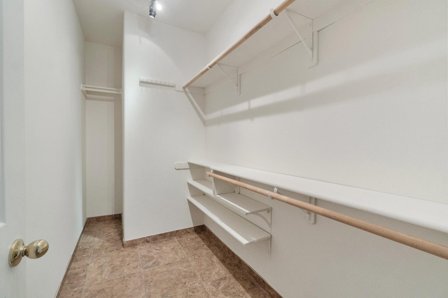 6864 Rodeo Drive Sanger, CA 93657 - Photo 40 of 48 a view of an empty walk in closet