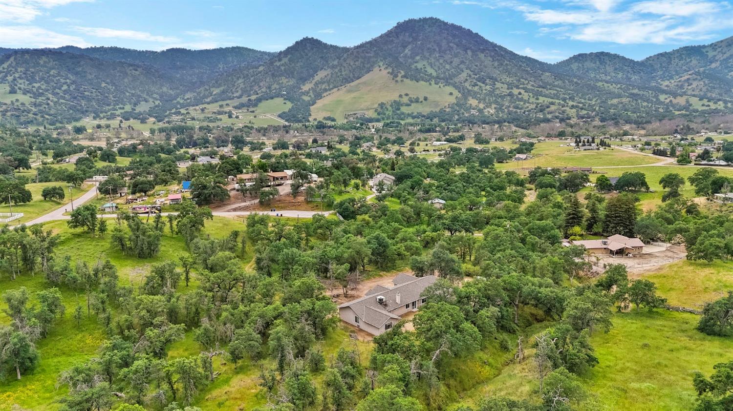 6864 Rodeo Drive Sanger, CA 93657 - Photo 46 of 48 a view of a house with a mountain