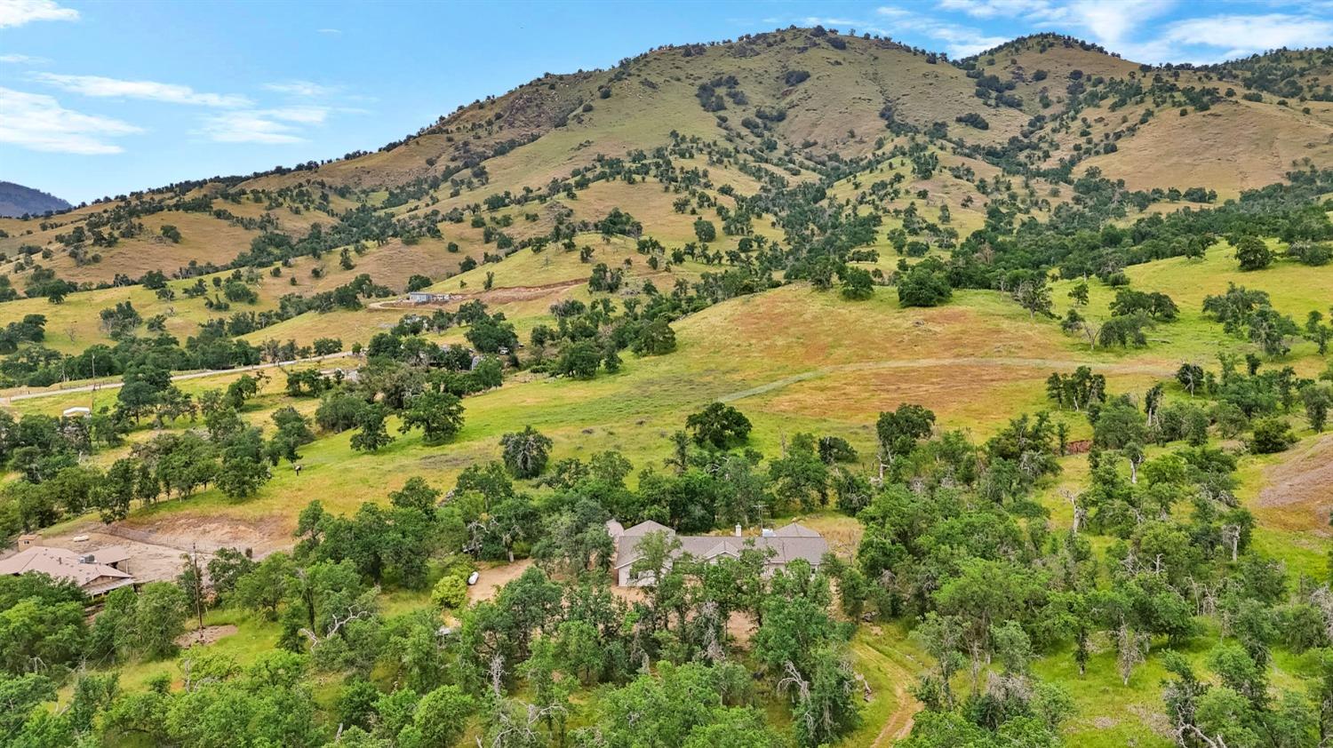 6864 Rodeo Drive Sanger, CA 93657 - Photo 47 of 48 a view of a large mountain with a lake in the back