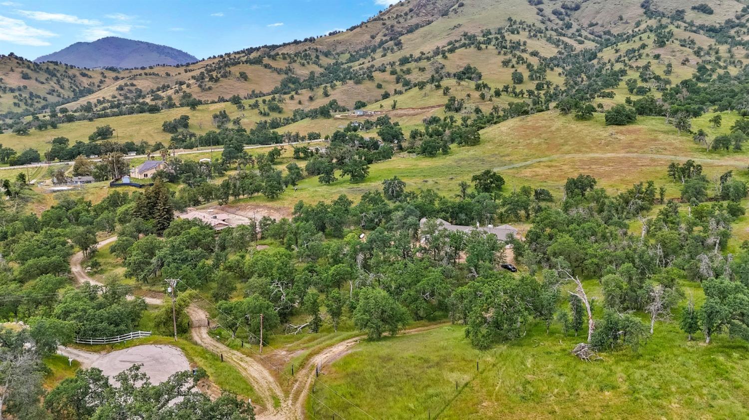 6864 Rodeo Drive Sanger, CA 93657 - Photo 48 of 48 a view of a yard with a house in the background