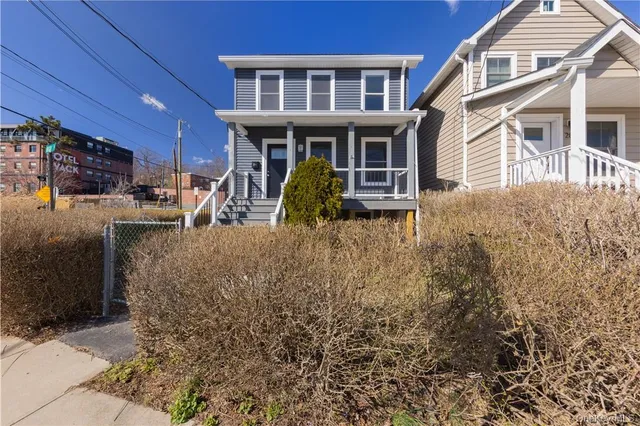 a view of a house with patio