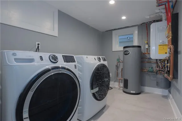 a utility room with dryer and washer