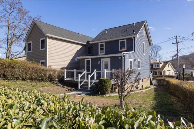 a house view with a garden space