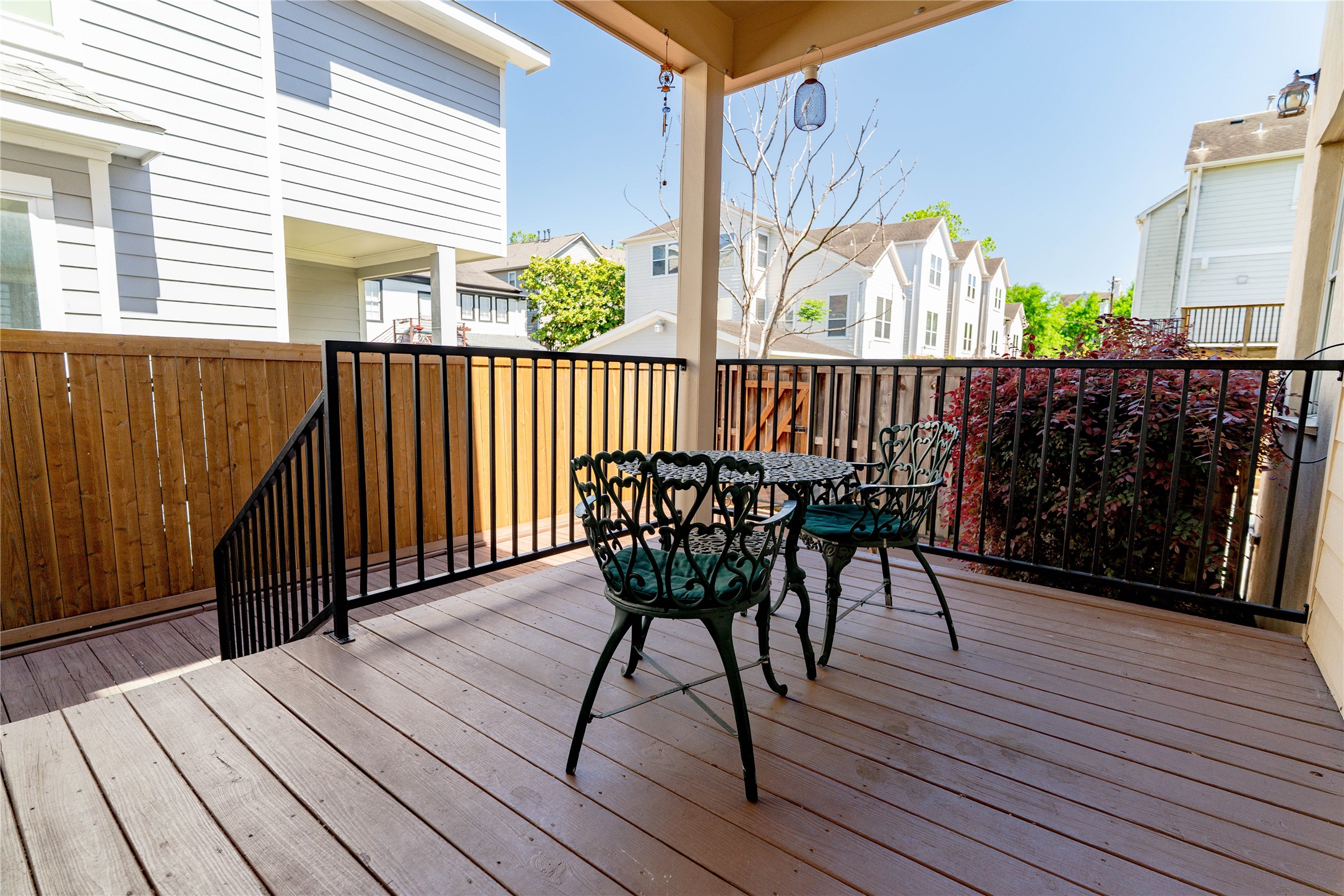 3015 Caroline Street, Unit D Houston, TX 77004 - Photo 14 of 16 a view of a balcony with wooden floor