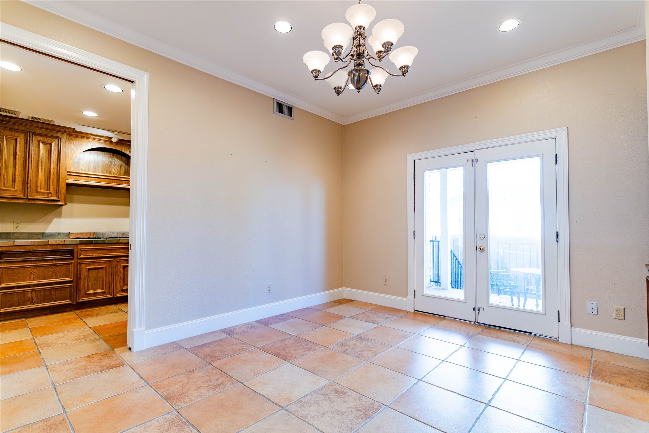 3015 Caroline Street, Unit D Houston, TX 77004 - Photo 4 of 16 a view of kitchen with granite countertop cabinets and outdoor space