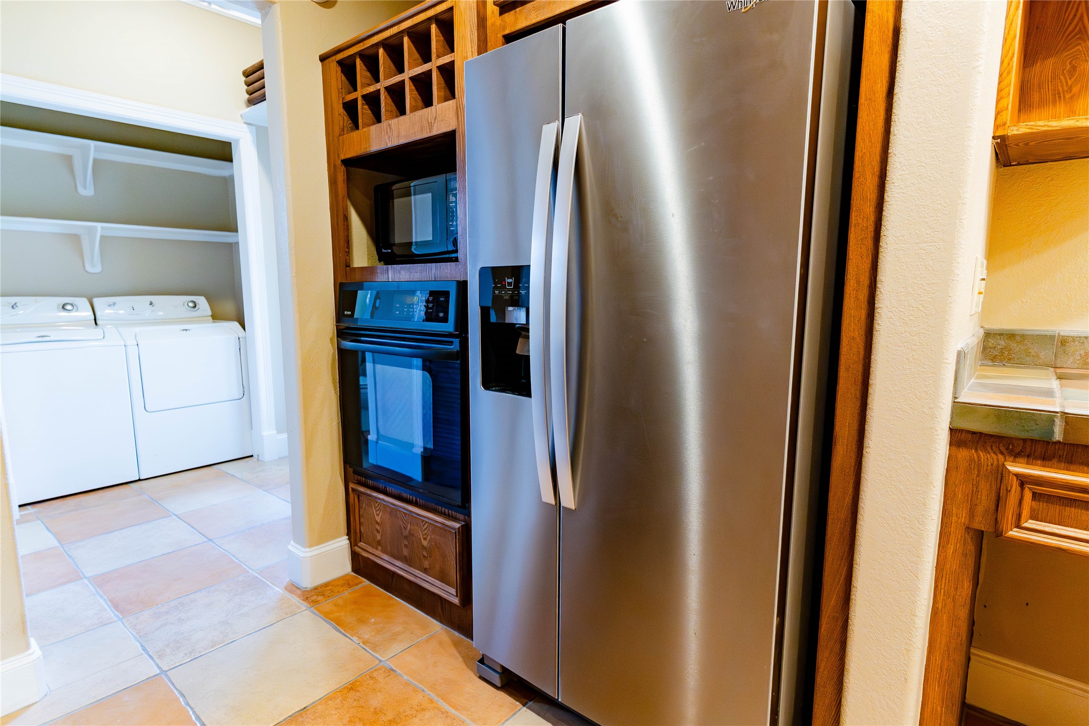 3015 Caroline Street, Unit D Houston, TX 77004 - Photo 7 of 16 a view of hallway with washer and dryer