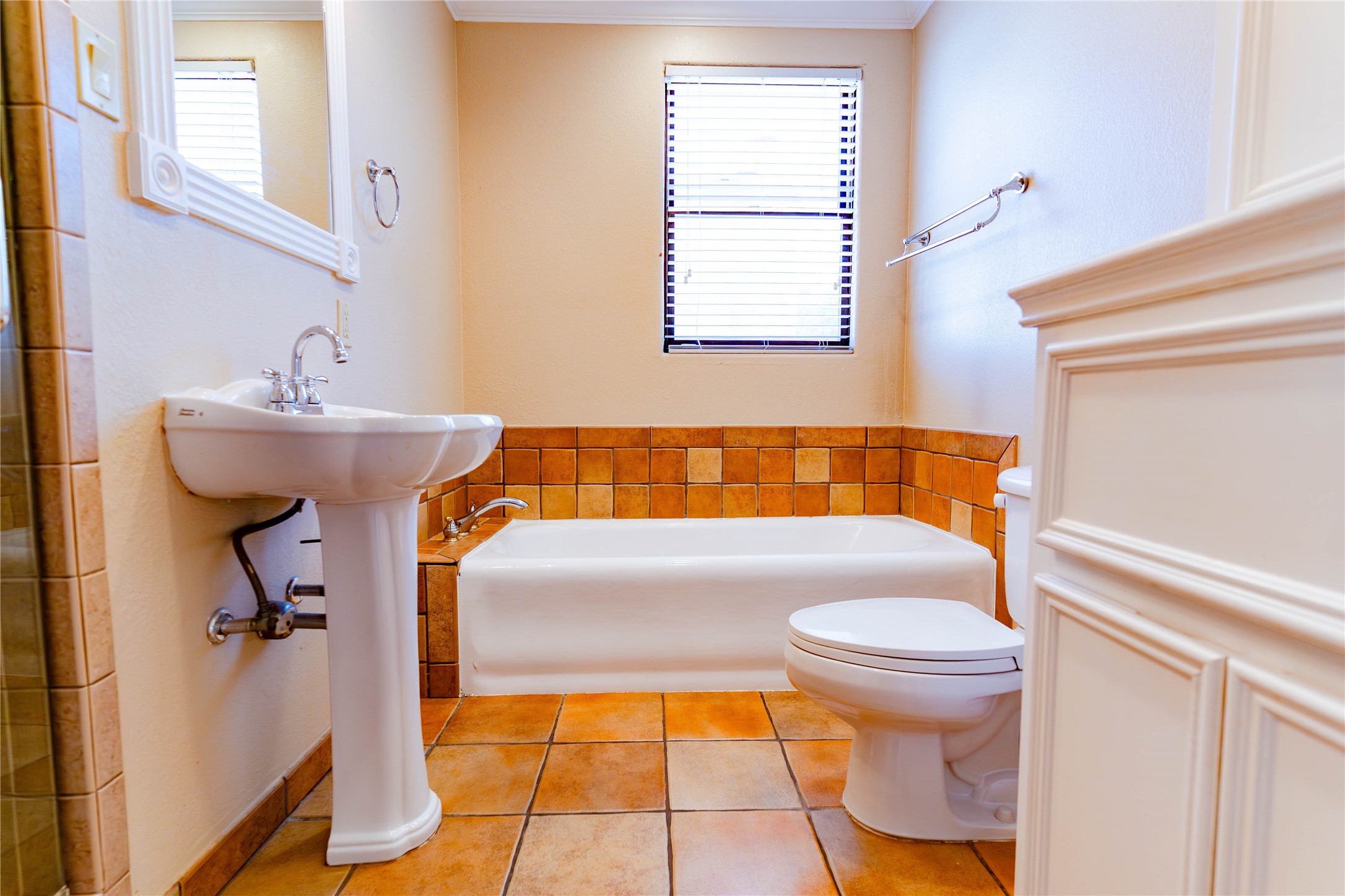 3015 Caroline Street, Unit D Houston, TX 77004 - Photo 10 of 16 a bathroom with a sink and a toilet