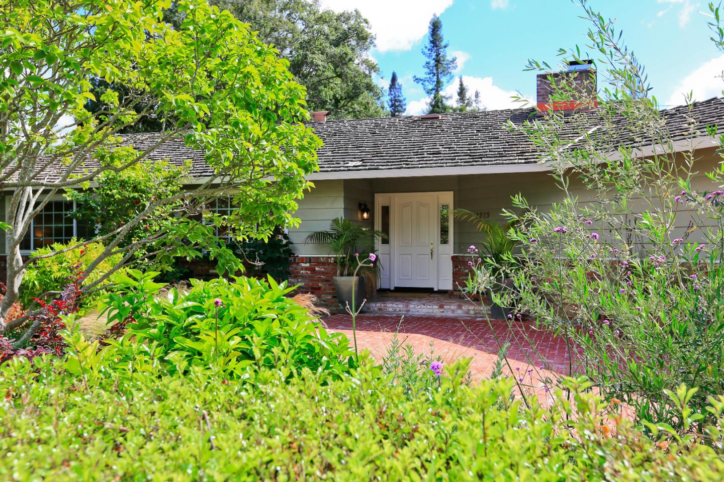 1219 Whitaker Way Menlo Park, CA 94025 - Photo 2 of 19 a view of a house with a yard and sitting area