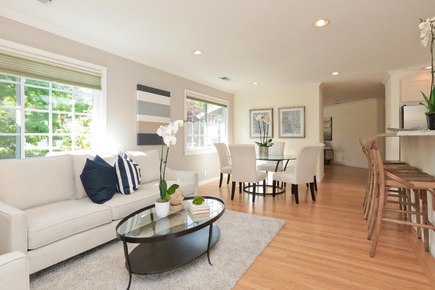1219 Whitaker Way Menlo Park, CA 94025 - Photo 8 of 19 a living room with furniture wooden floor and a large window