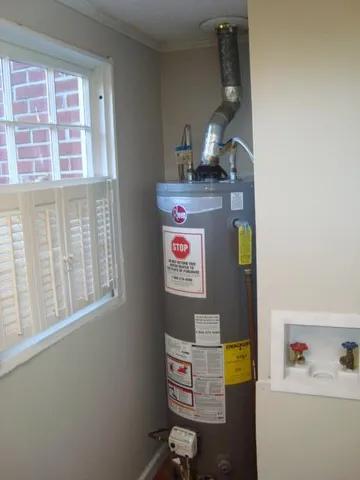 a view of storage and utility room with washer and dryer