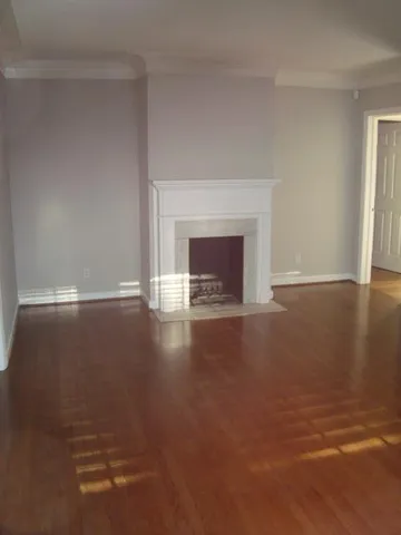 a view of room with hardwood floor