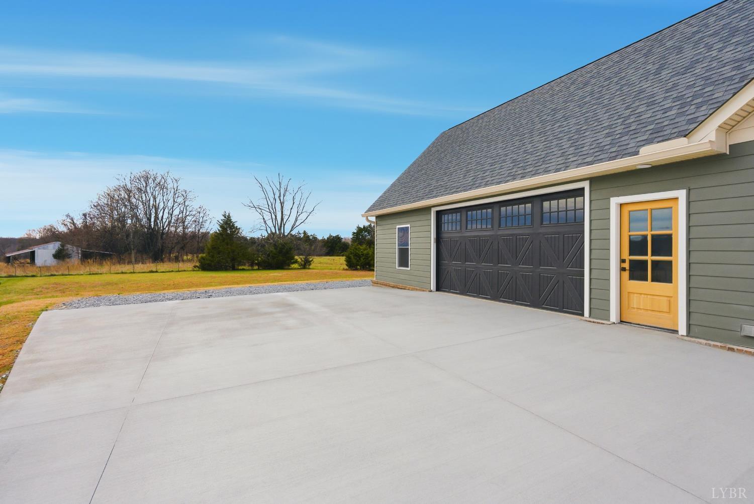 4615 Everett Road Forest, VA 24551 - Photo 3 of 56 a view of swimming pool with sitting area and garden