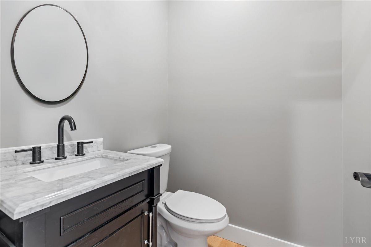 4615 Everett Road Forest, VA 24551 - Photo 37 of 56 a bathroom with a sink and a mirror