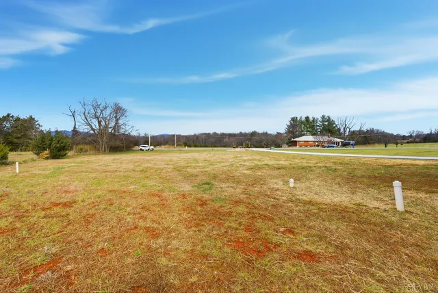 a picture of a room with a floor in a white house