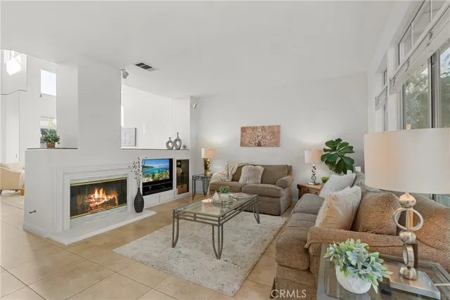 a bathroom with a shower sink and mirror