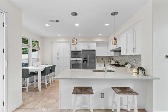 a view of a house with a big yard