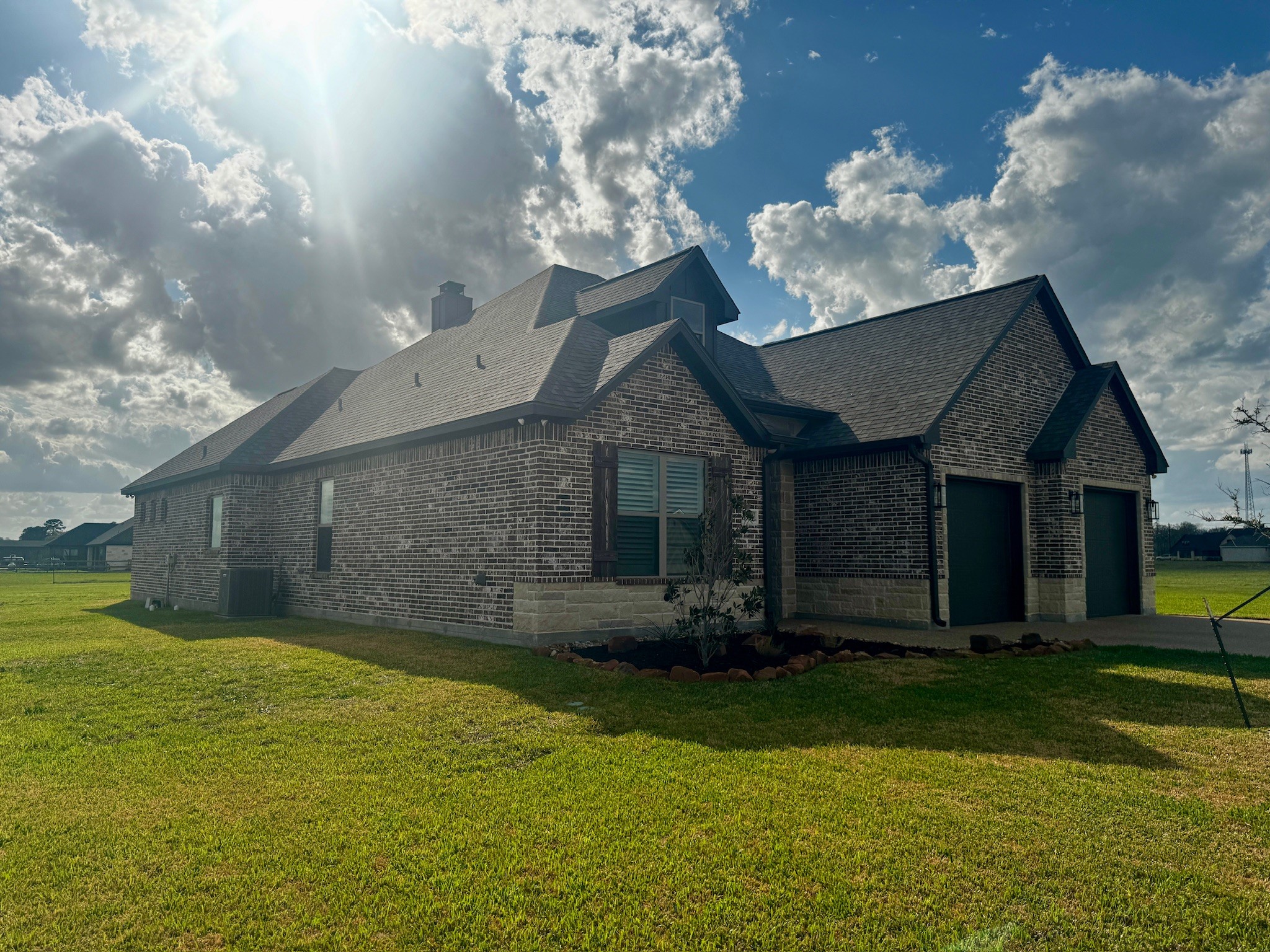 5854 Reliance Ridge Circle Bryan, TX 77808 - Photo 11 of 32 a front view of a house with garden