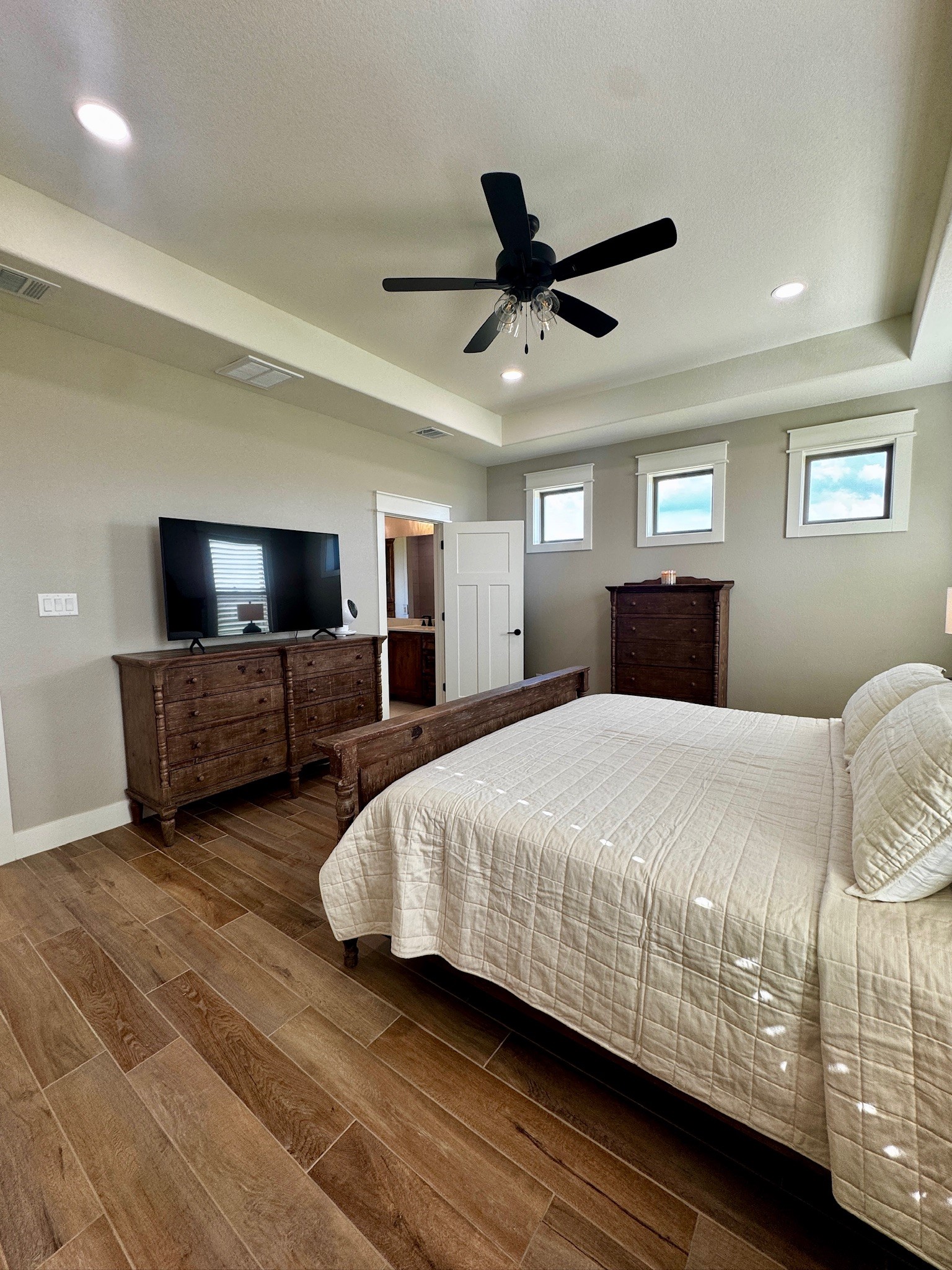 5854 Reliance Ridge Circle Bryan, TX 77808 - Photo 20 of 32 a large bedroom with bed and window