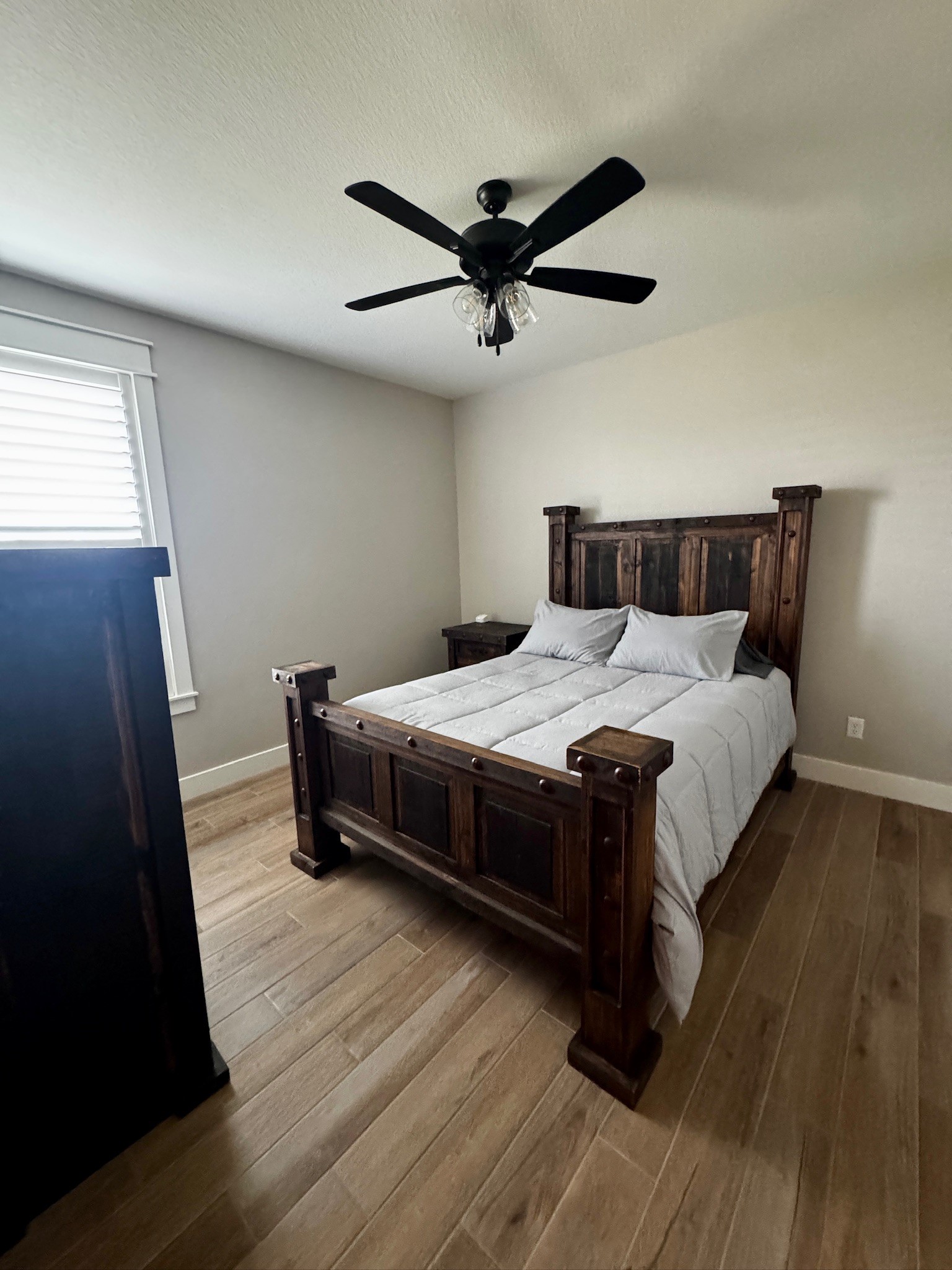 5854 Reliance Ridge Circle Bryan, TX 77808 - Photo 22 of 32 a bedroom with a bed and a mirror