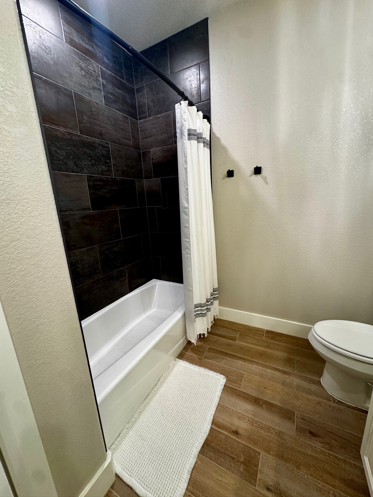 5854 Reliance Ridge Circle Bryan, TX 77808 - Photo 26 of 32 a bathroom with a sink and a tub