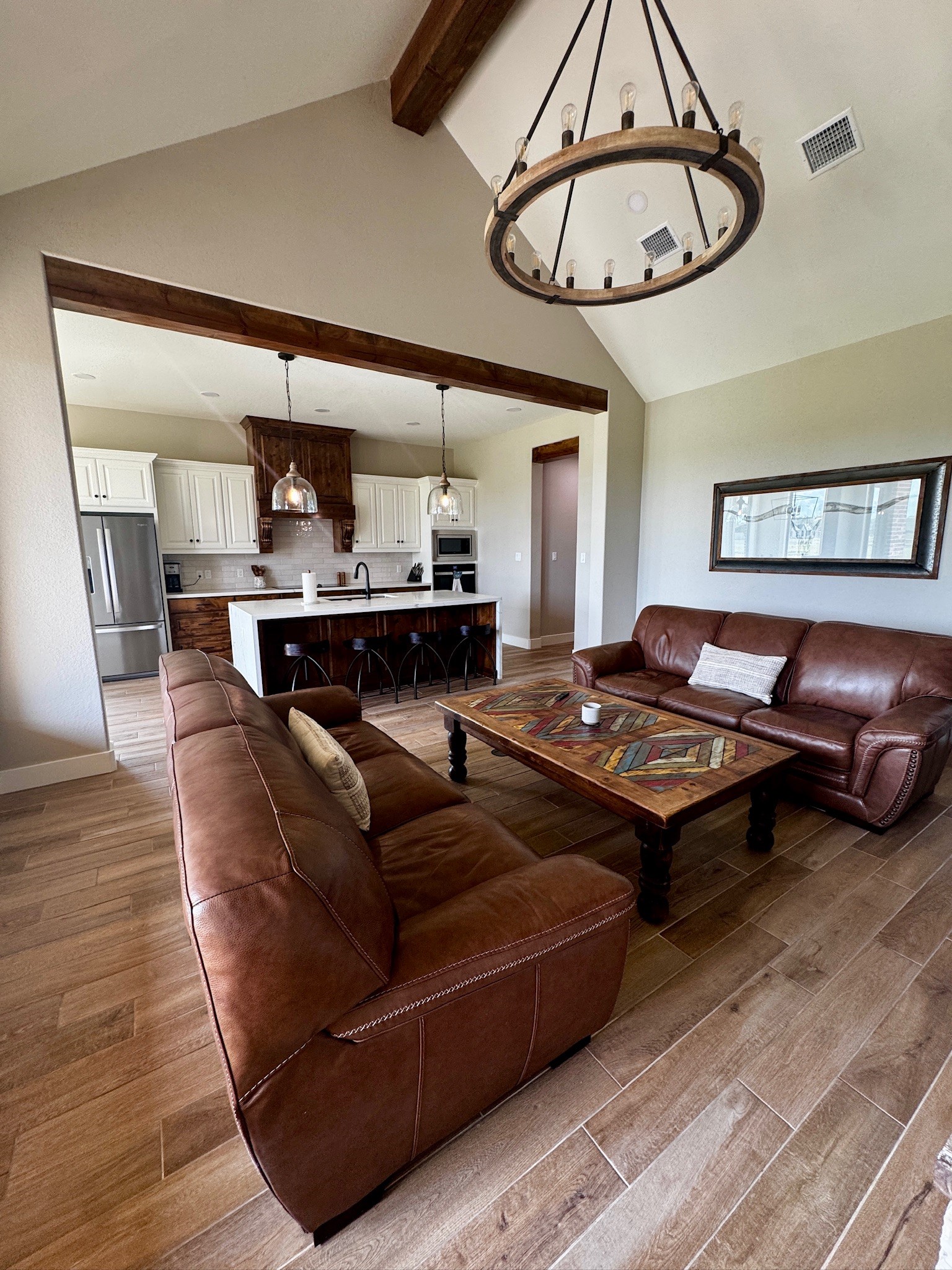 5854 Reliance Ridge Circle Bryan, TX 77808 - Photo 3 of 32 a living room with furniture and kitchen view