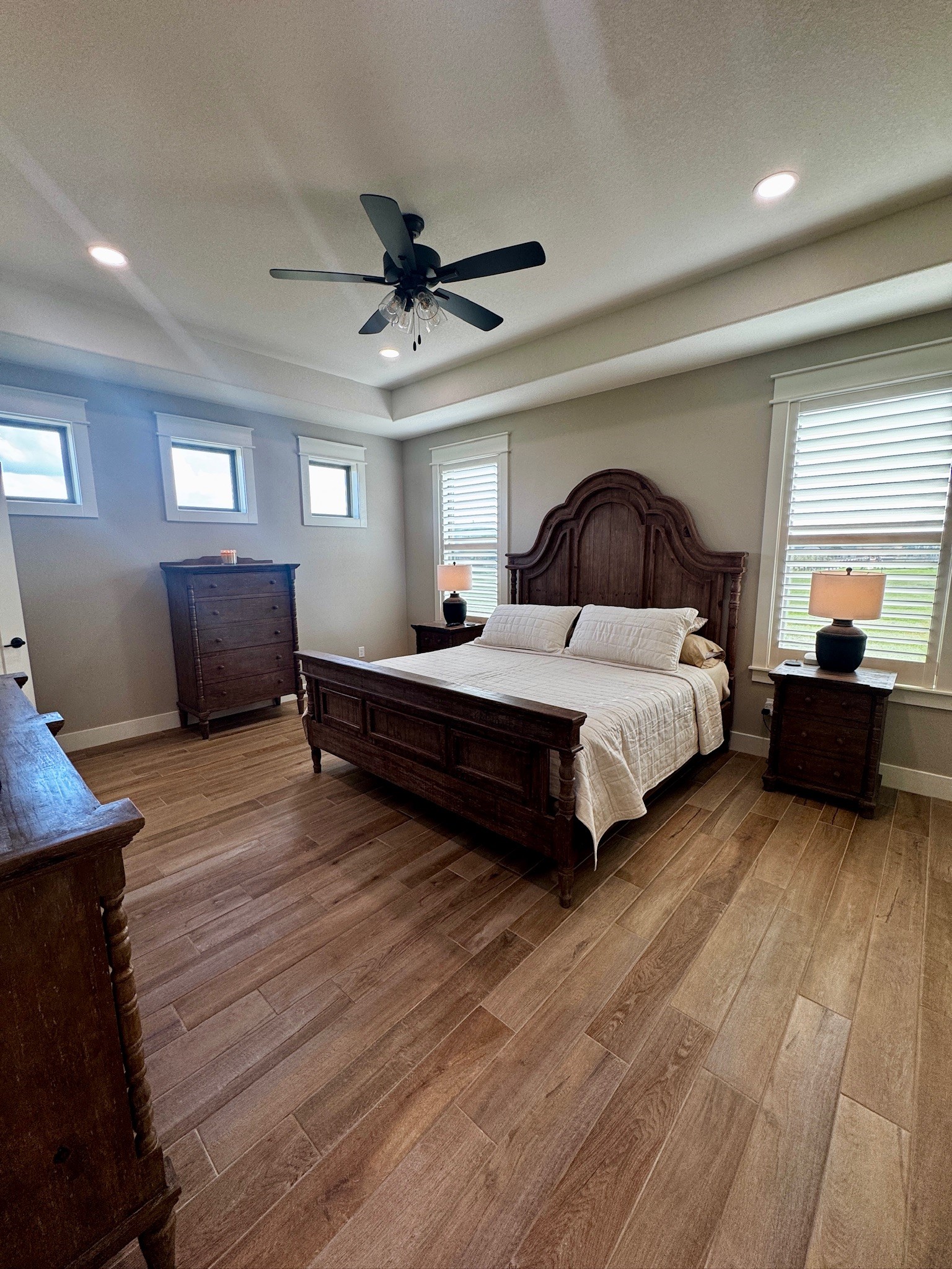 5854 Reliance Ridge Circle Bryan, TX 77808 - Photo 6 of 32 a spacious bedroom with a bed and a couch