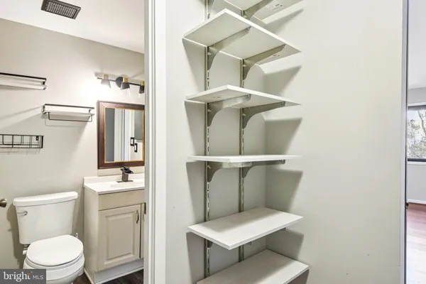 a bathroom with a toilet and a sink