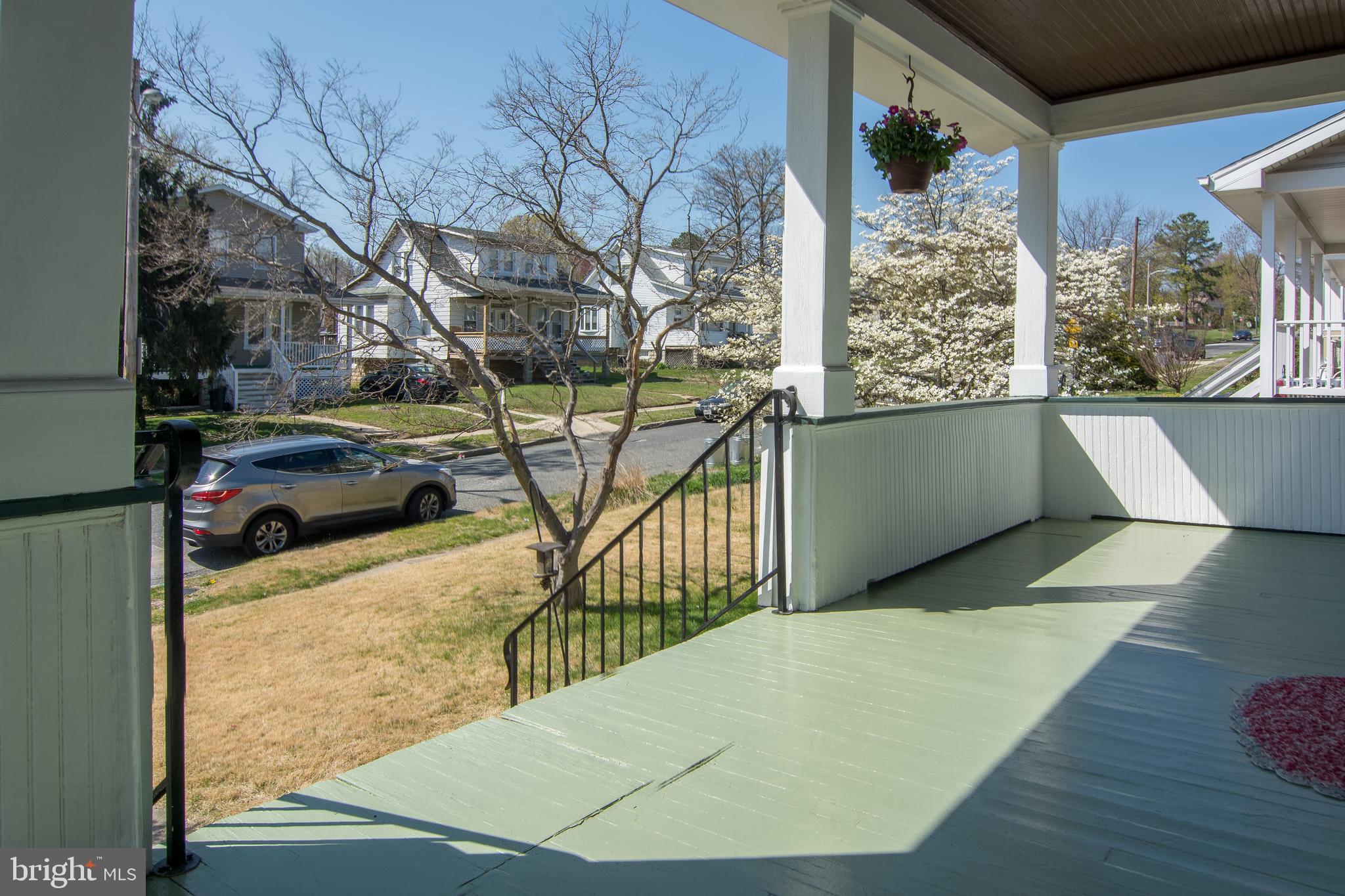 5601 Tramore Road Baltimore, MD 21214 - Photo 2 of 32 Relax on the sunny front porch.