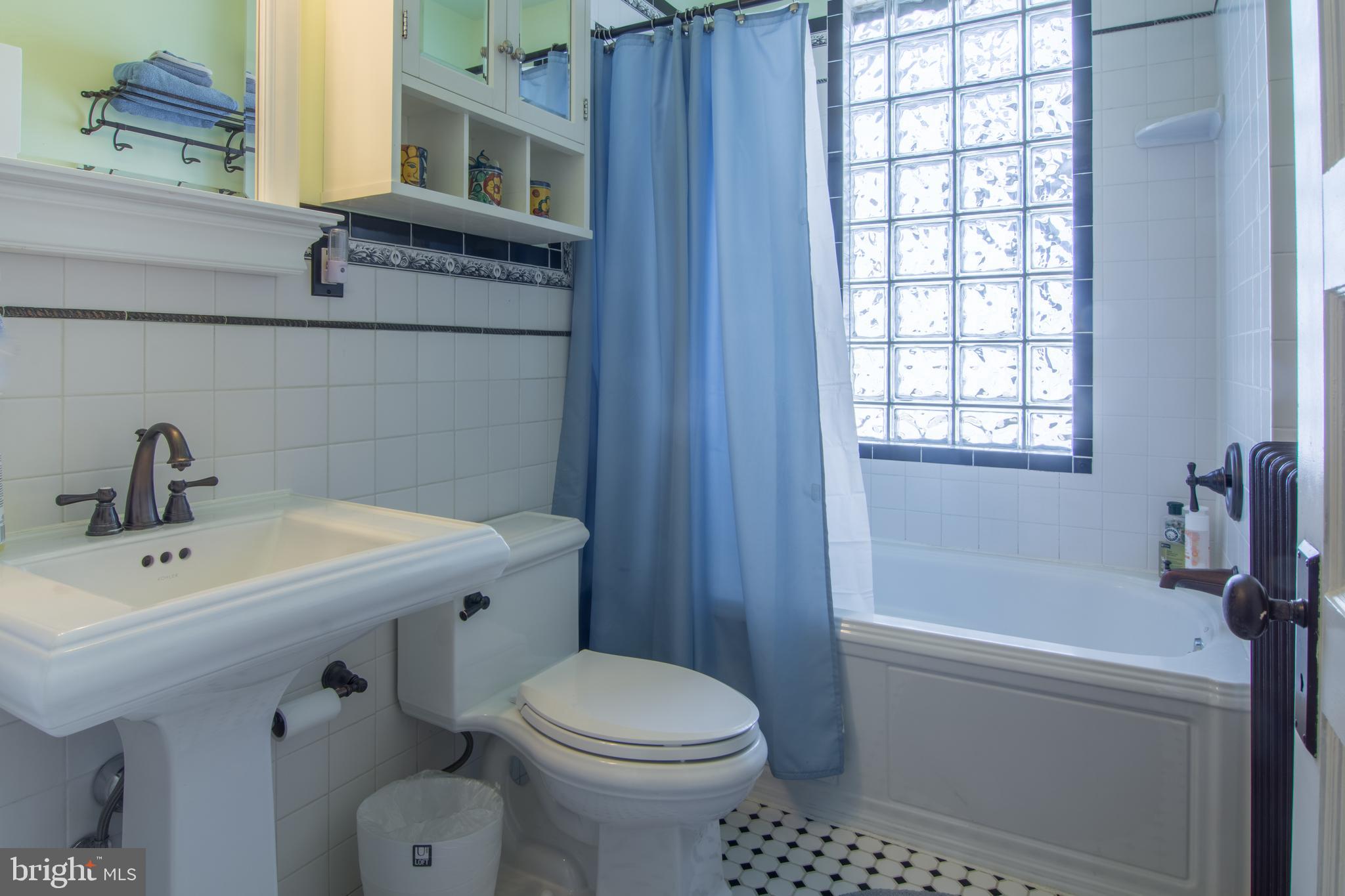 5601 Tramore Road Baltimore, MD 21214 - Photo 14 of 32 Gorgeous tile bathroom