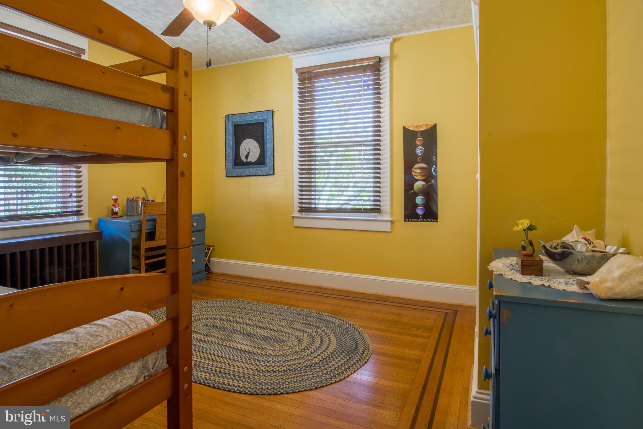 5601 Tramore Road Baltimore, MD 21214 - Photo 20 of 32 First floor bedroom with inlayed hardwoods