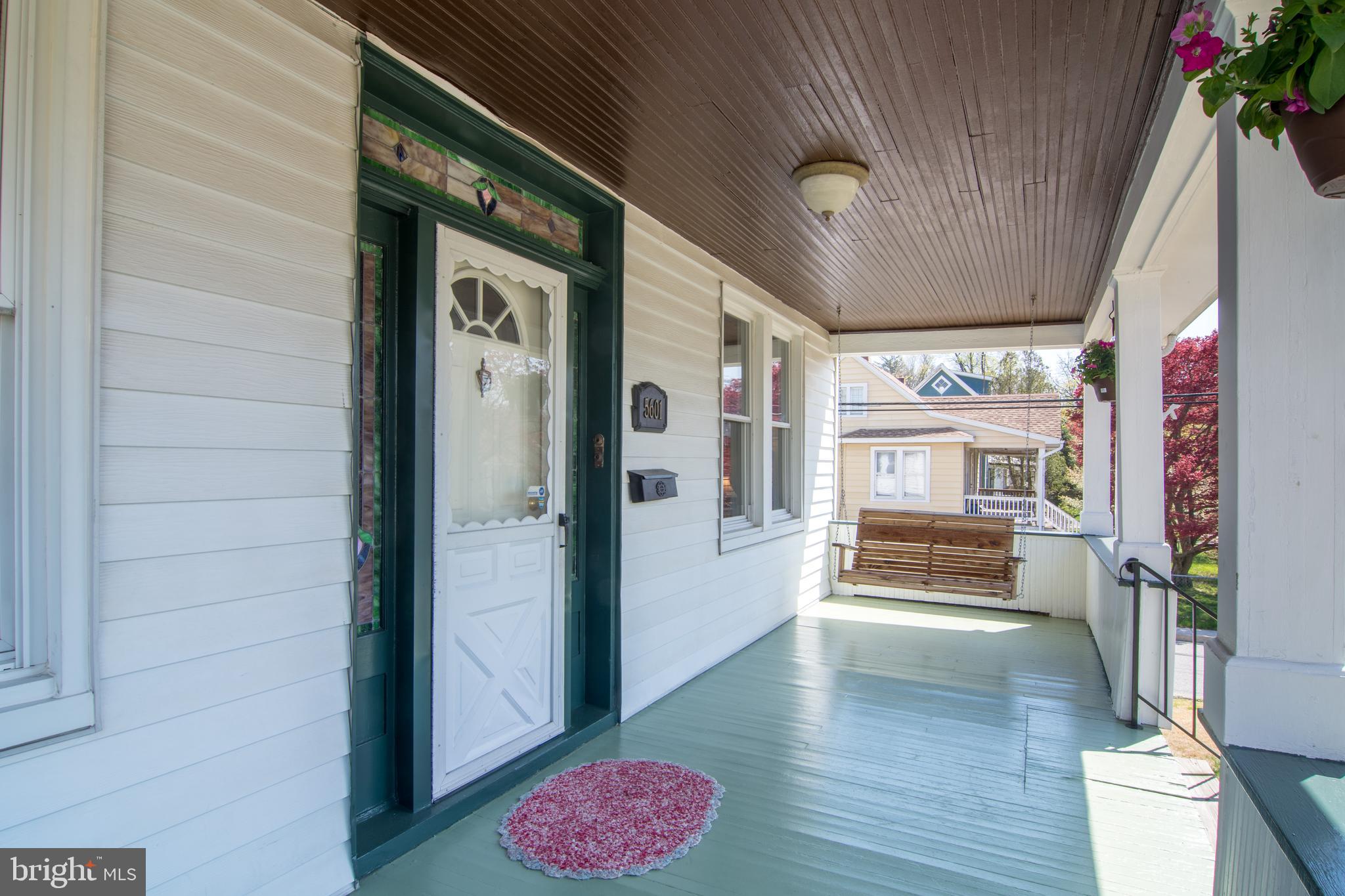 5601 Tramore Road Baltimore, MD 21214 - Photo 3 of 32 Covered front porch complete with porch swing!