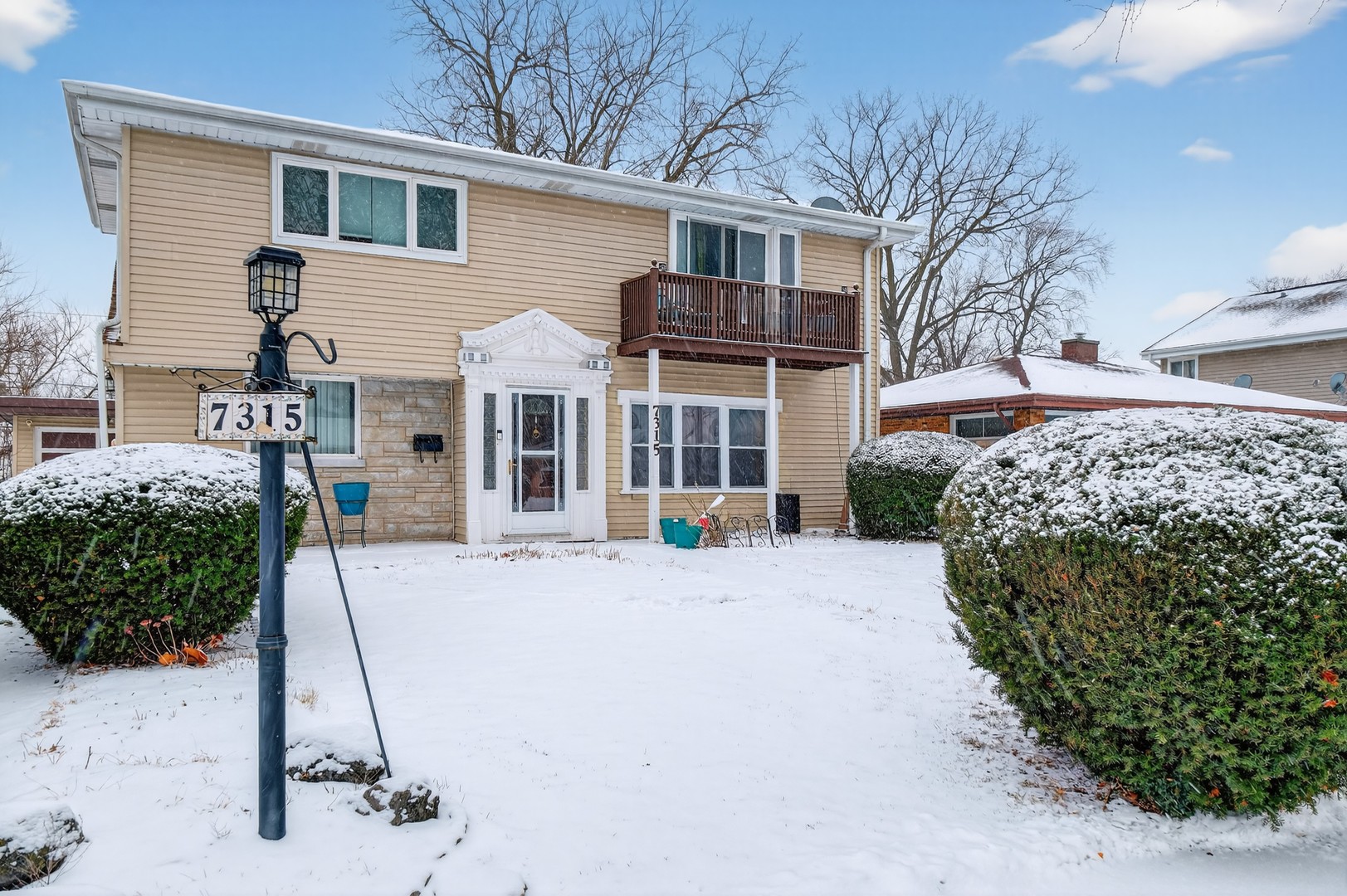 7315 Arcadia Street Morton Grove, IL 60053 - Photo 3 of 15 a view of a house with a snow on the road