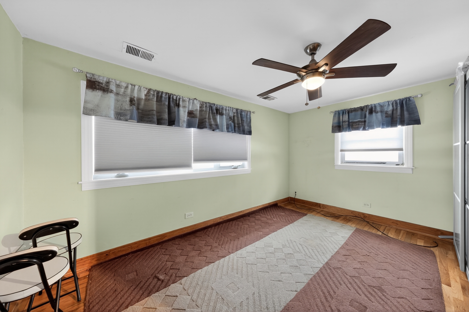 7315 Arcadia Street Morton Grove, IL 60053 - Photo 4 of 15 a view of room with window and ceiling fan