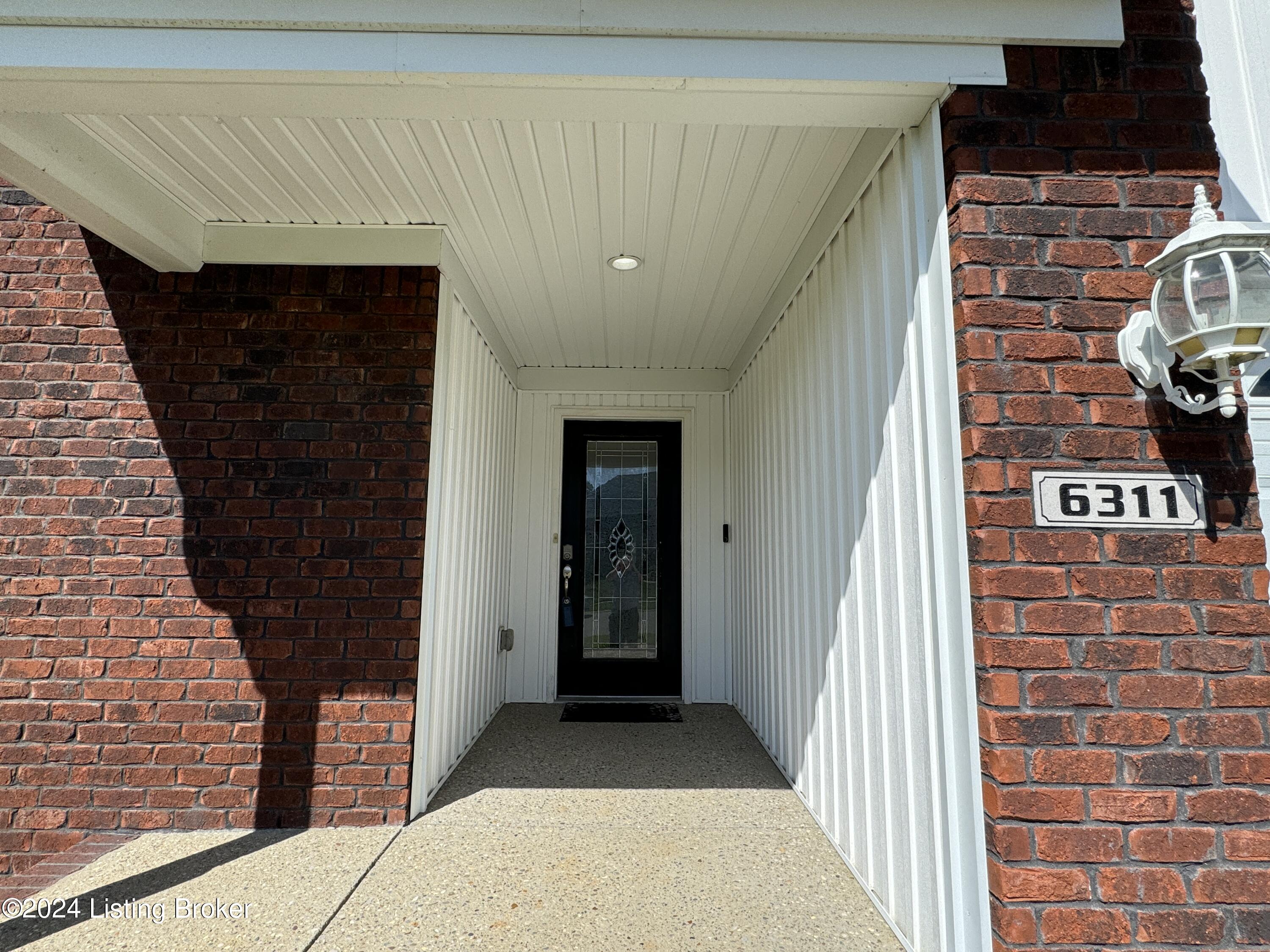 6311 Hollow Tree Road Louisville, KY 40291 - Photo 33 of 35 Covered Front Porch and Entrance