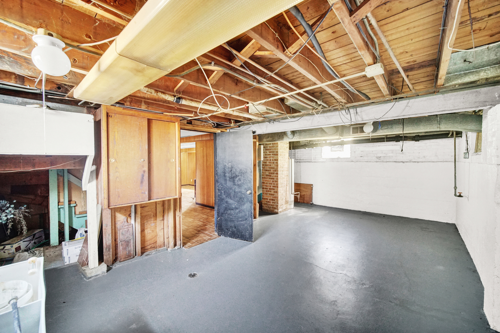 14528 Grant Street Dolton, IL 60419 - Photo 20 of 26 a view of an empty room with wooden floor and staircase