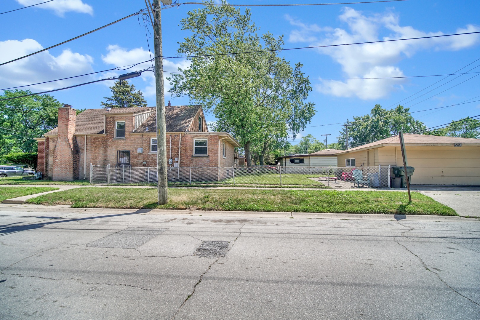 14528 Grant Street Dolton, IL 60419 - Photo 26 of 26 a view of street along with house and trees