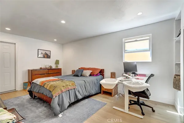 a kitchen with a stove and a refrigerator