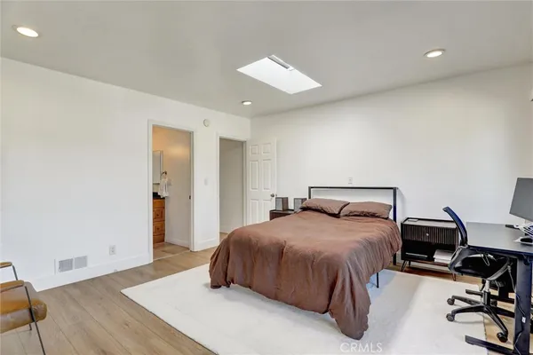 a balcony with a table and chairs