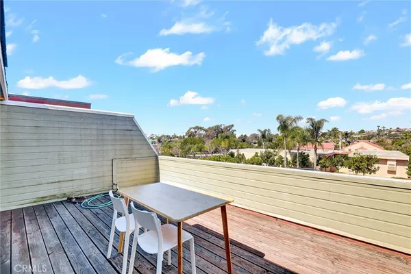 a bed room with a bed and a chair