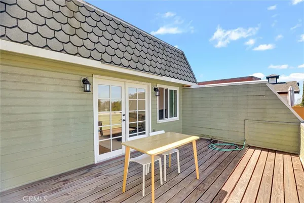 a bathroom with a sink mirror and toilet