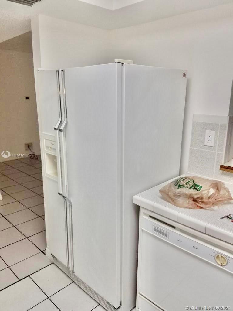 11790 Southwest 18th Street, Unit 1073 Miami, FL 33175 - Photo 11 of 18 a bathroom with a sink and a shower